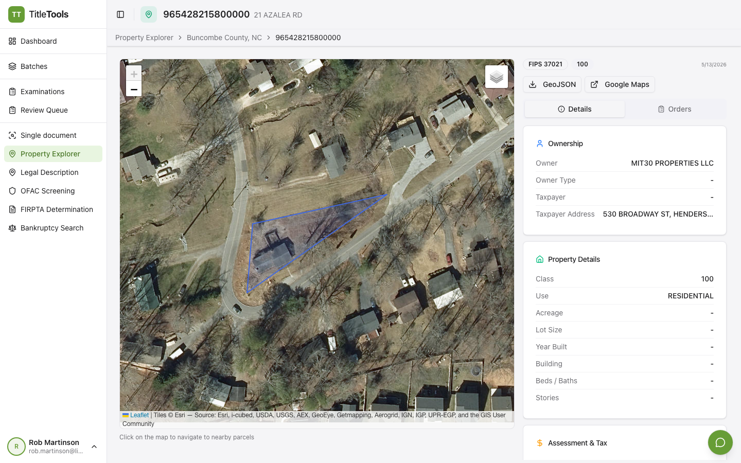 TitleTools Property Explorer showing a parcel polygon overlaid on a satellite view of an Asheville NC property with owner and tax info